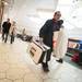 A Black Friday shopper walks through the Briarwood mall as he carries several large shopping bags.
Courtney Sacco I AnnArbor.com 